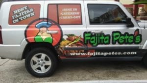 White van with a car wrap for Fajita Pete's