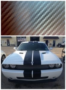 White dodge car with racing stripe decals