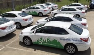 Fleet of cars with vinyl car wrap decals for diagnostic service company