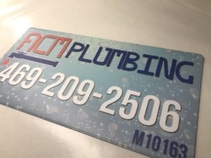 Blue car magnet for a plumbing company