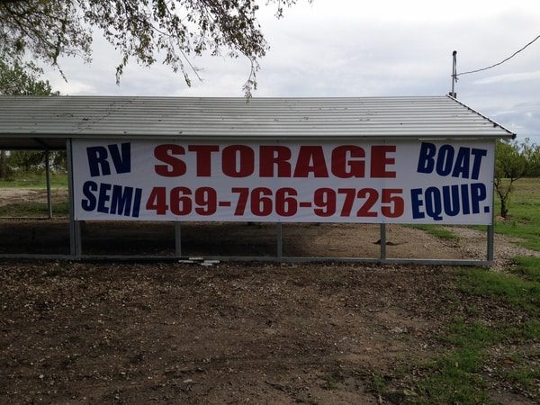 Awning with large banner hanging advertising Boat and RV storage