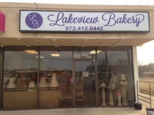 Purple storefront sign for Lakeview Bakery