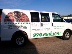 White van with vinyl decals for a plant and landscaping company