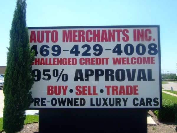 Billboard sign for auto merchant company