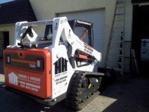 Foundation repair machinery with vinyl decals