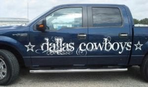 Blue Ford F150 with Dallas Cowboys decals