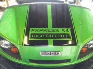 Green golf cart with black vinyl decals
