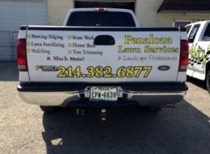White F350 truckbed with yellow vinyl lettering for law service company